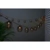 B&M 20 Solar Powered Black Rattan Effect String Lights 1 B&M 20 Solar Powered Black Rattan Effect String Lights -B and M Shop 392923 20 solar powered black rattan effect string lights